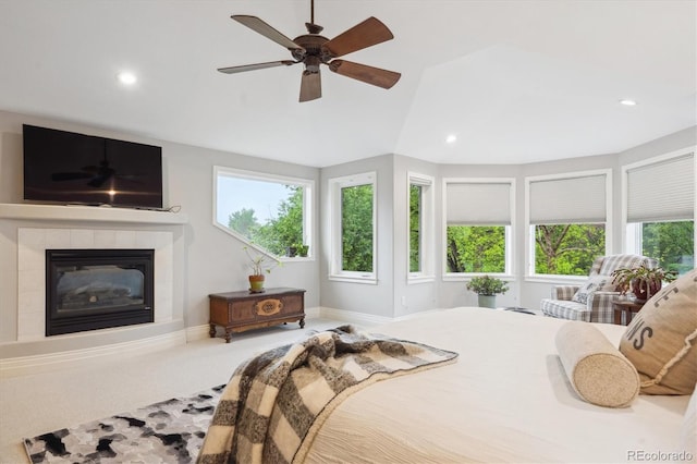 4059 Nevis St, Boulder, CO 80301 - bedroom with multiple windows, recessed lighting, a tile fireplace, baseboards, and carpet flooring