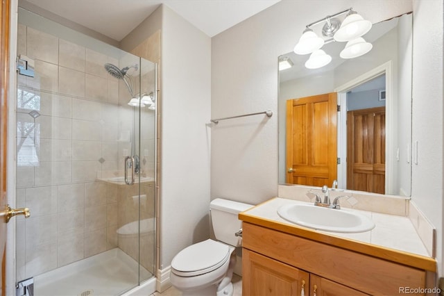 4059 Nevis St, Boulder, CO 80301 - bathroom featuring toilet, a shower stall, and vanity