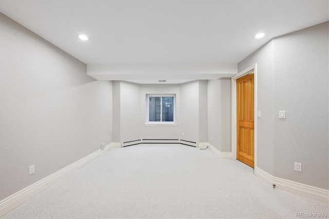 4059 Nevis St, Boulder, CO 80301 - basement with carpet flooring, recessed lighting, baseboards, baseboard heating, and a baseboard radiator
