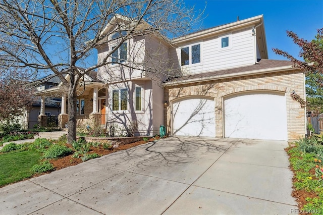 4059 Nevis St, Boulder, CO 80301 - traditional home with brick siding, concrete driveway, and a garage