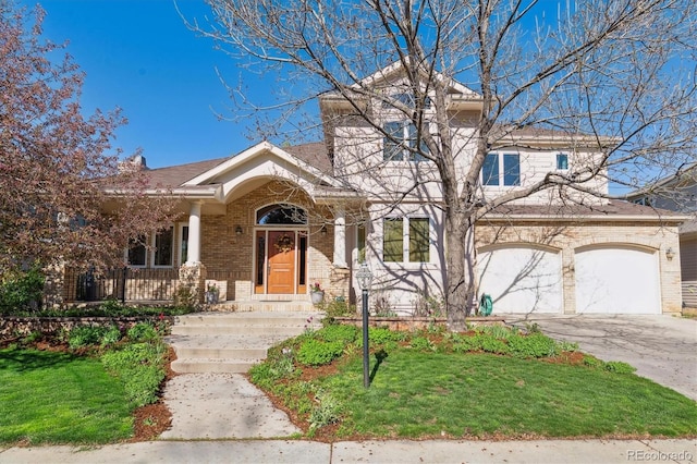 4059 Nevis St, Boulder, CO 80301 - view of front facade with brick siding, driveway, and a front yard