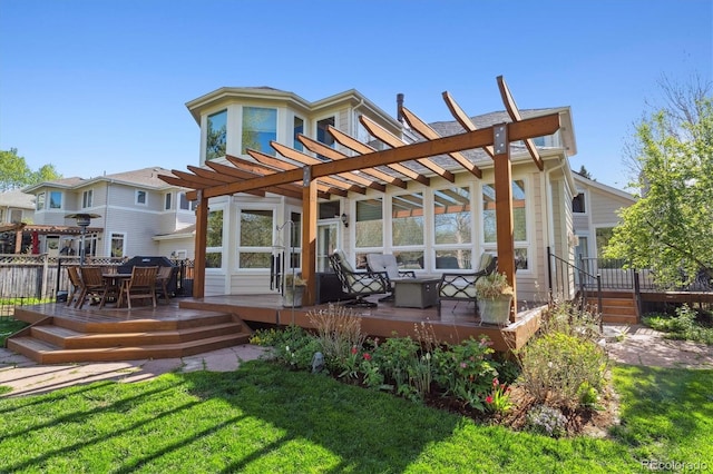 4059 Nevis St, Boulder, CO 80301 - rear view of property with a pergola, a deck, outdoor dining space, and a lawn