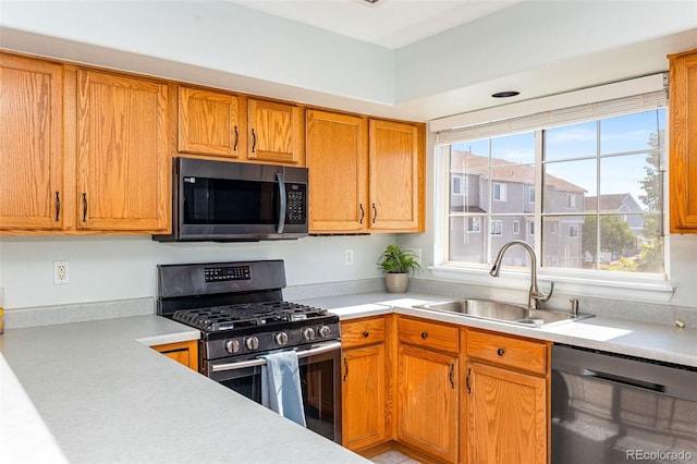 8199 Welby Rd Unit 4106, Denver, CO 80229 - kitchen with stainless steel appliances, light countertops, and healthy amount of natural light