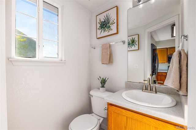 8199 Welby Rd Unit 4106, Denver, CO 80229 - half bathroom with toilet and vanity