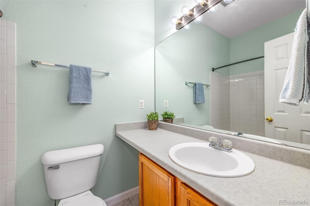 8199 Welby Rd Unit 4106, Denver, CO 80229 - full bathroom with vanity, a shower, and tile patterned floors