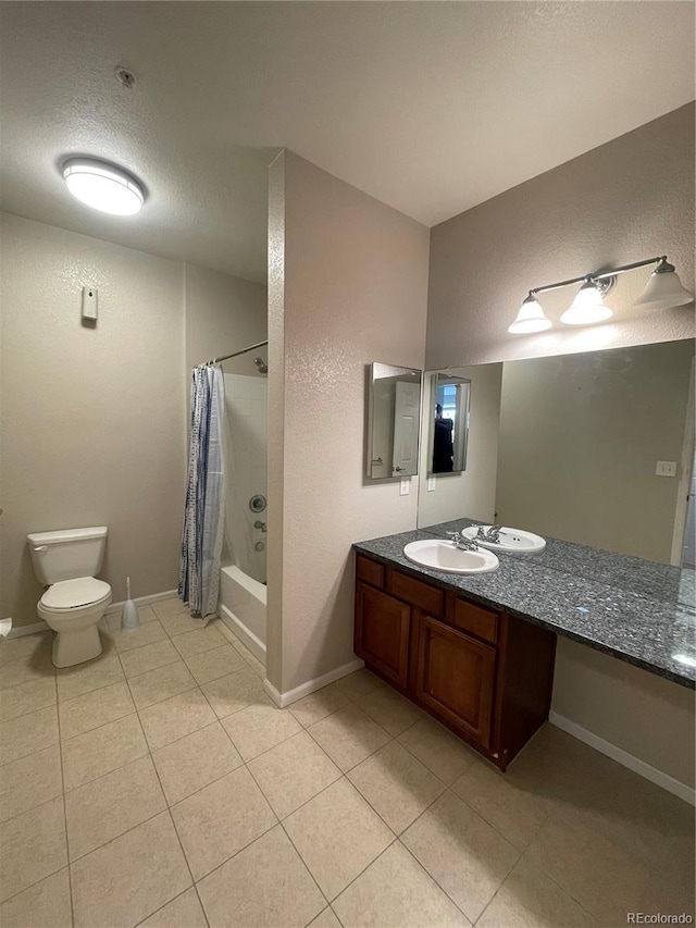 full bathroom with toilet, a textured ceiling, tile patterned floors, shower / bath combo, and vanity