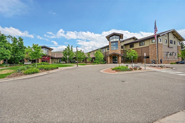 14300 E Marina Dr Unit 109, Aurora, CO 80014 - view of asphalt street with street lights, curbs, sidewalks, and a residential view
