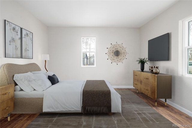 bedroom featuring dark hardwood / wood-style floors