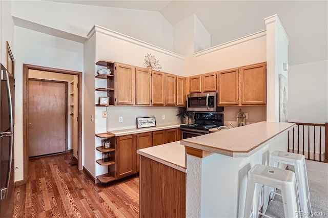 kitchen featuring open shelves, stainless steel appliances, a peninsula, light countertops, and high vaulted ceiling