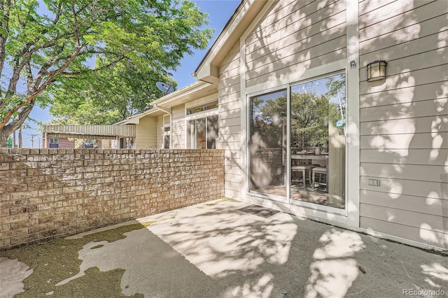 view of patio / terrace with fence
