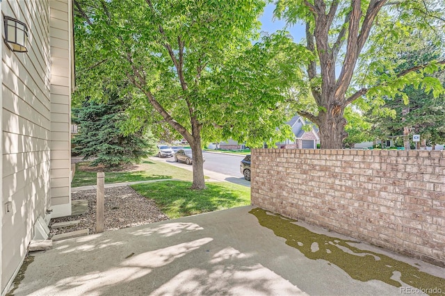 view of patio / terrace featuring fence