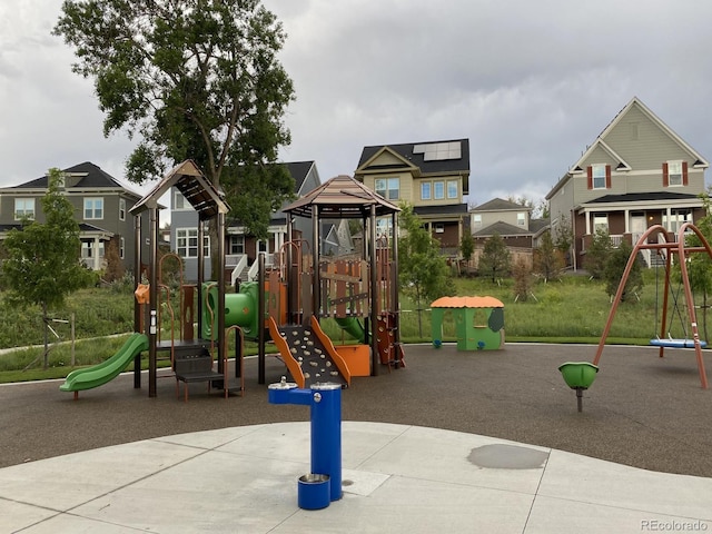 community playground featuring a residential view