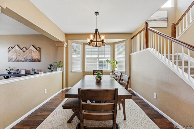 12996 Banyon Cir, Parker, CO 80134 - dining room featuring stairway, a chandelier, and wood finished floors
