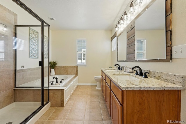 12996 Banyon Cir, Parker, CO 80134 - full bath featuring a garden tub, double vanity, a stall shower, and tile patterned flooring