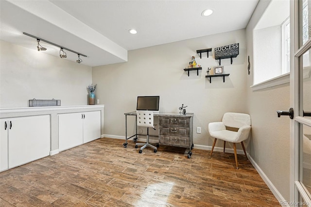 12996 Banyon Cir, Parker, CO 80134 - office area featuring track lighting, wood finished floors, and recessed lighting