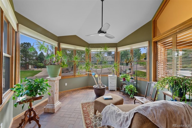 9 Red Fox Ln, Littleton, CO 80127 - sunroom with healthy amount of natural light, lofted ceiling, and baseboards
