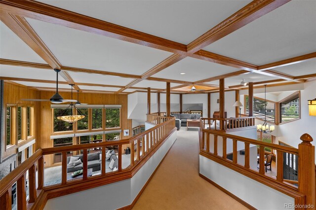9 Red Fox Ln, Littleton, CO 80127 - hallway featuring coffered ceiling, an upstairs landing, healthy amount of natural light, carpet flooring, and a chandelier