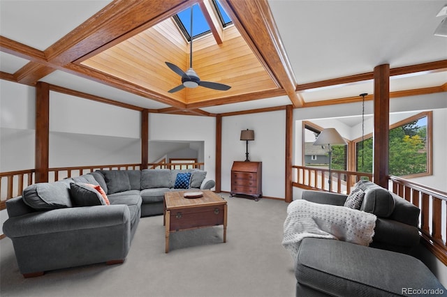 9 Red Fox Ln, Littleton, CO 80127 - carpeted living area featuring ceiling fan, a skylight, beam ceiling, and coffered ceiling