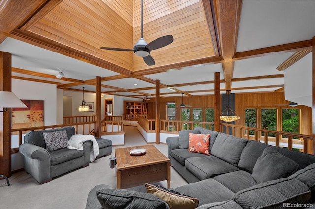9 Red Fox Ln, Littleton, CO 80127 - living room with carpet flooring, ceiling fan, wooden walls, beam ceiling, and coffered ceiling