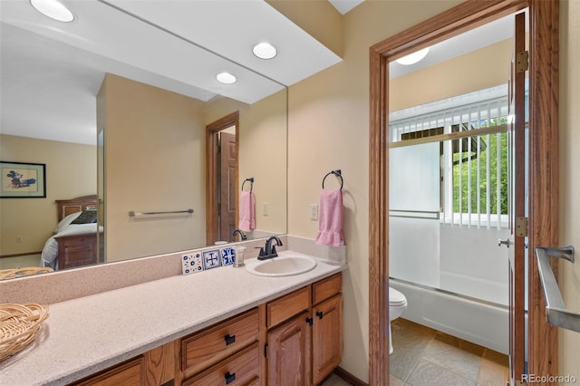 9 Red Fox Ln, Littleton, CO 80127 - full bath with ensuite bath, toilet, vanity, washtub / shower combination, and recessed lighting