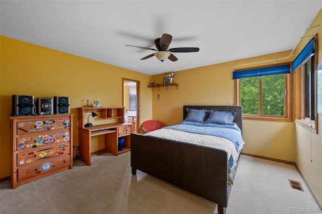9 Red Fox Ln, Littleton, CO 80127 - bedroom featuring light colored carpet, ceiling fan, and baseboards