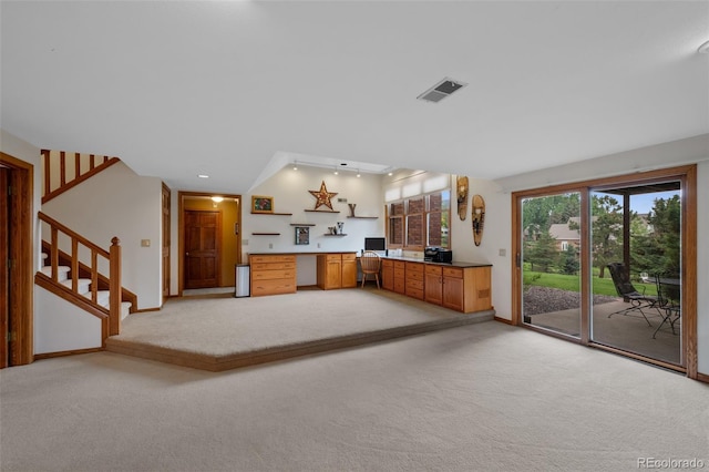 9 Red Fox Ln, Littleton, CO 80127 - kitchen featuring light carpet, open shelves, baseboards, and brown cabinetry