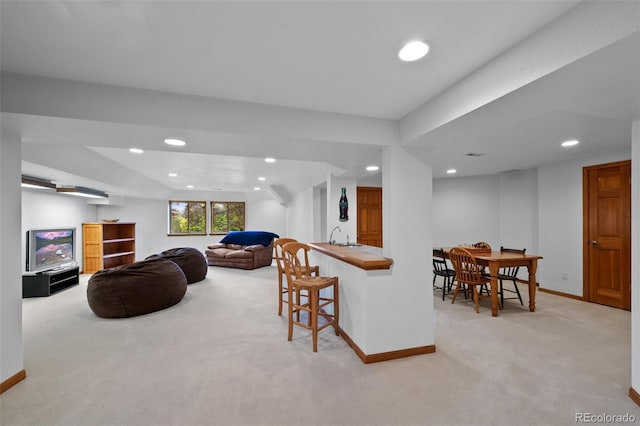 9 Red Fox Ln, Littleton, CO 80127 - living room with light colored carpet, baseboards, recessed lighting, and bar area