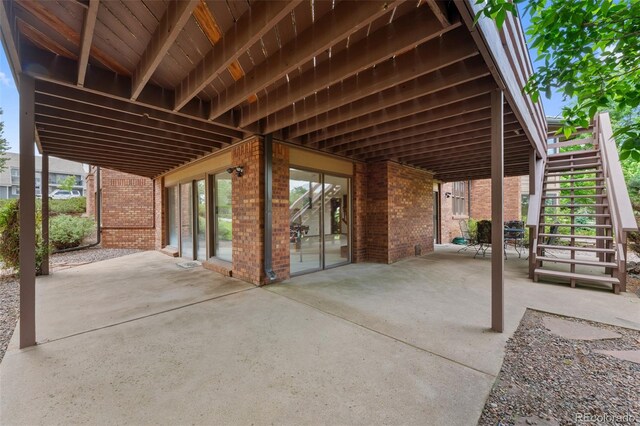 9 Red Fox Ln, Littleton, CO 80127 - view of patio / terrace featuring stairs