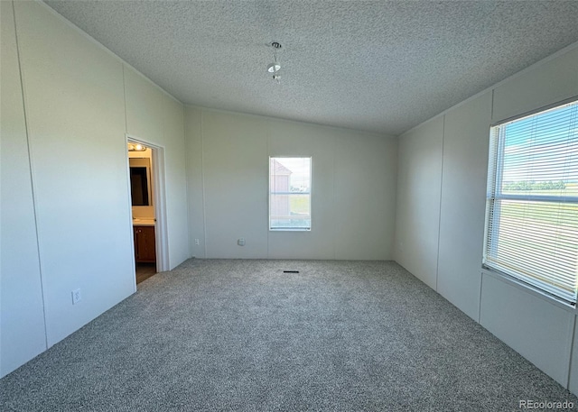 15125 Ewing Ct, Peyton, CO 80831 - carpeted spare room featuring a textured ceiling