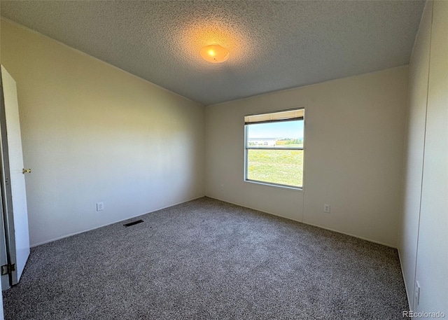 15125 Ewing Ct, Peyton, CO 80831 - empty room with carpet floors and a textured ceiling