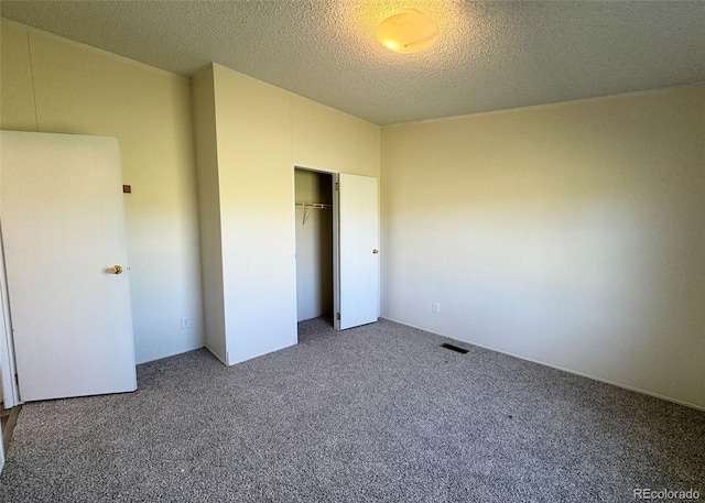 15125 Ewing Ct, Peyton, CO 80831 - unfurnished bedroom featuring carpet floors, a closet, and a textured ceiling