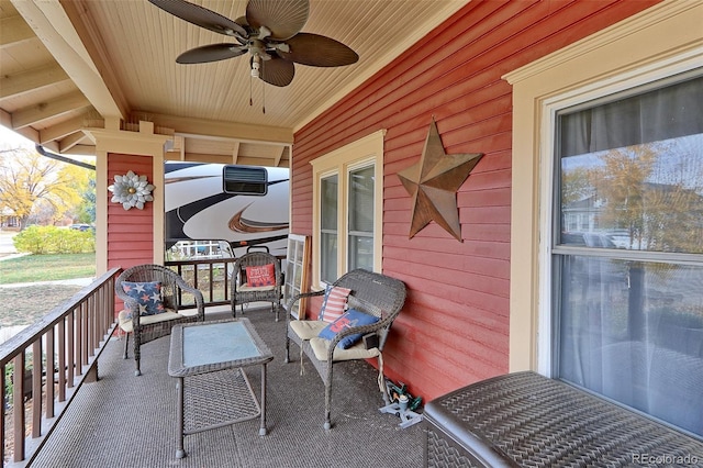 exterior space with ceiling fan