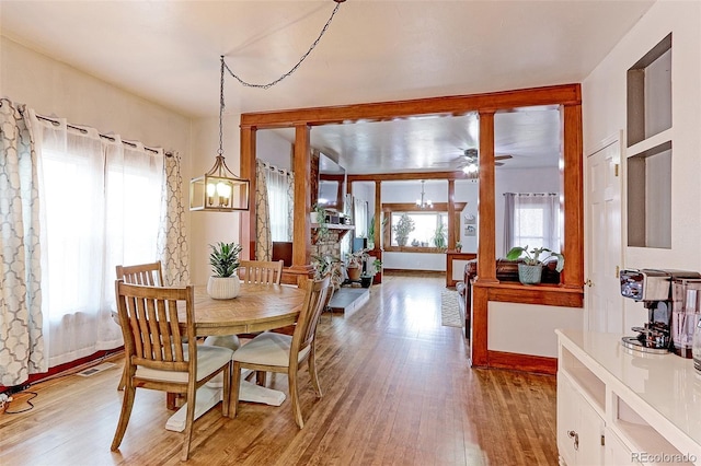 dining area featuring ceiling fan and light hardwood / wood-style floors