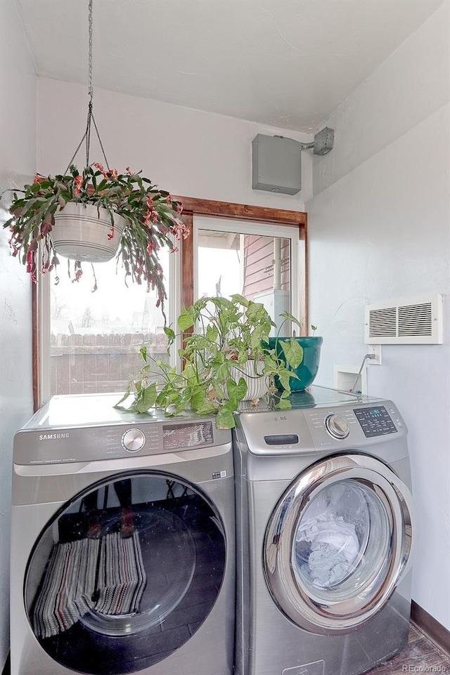 laundry area featuring independent washer and dryer