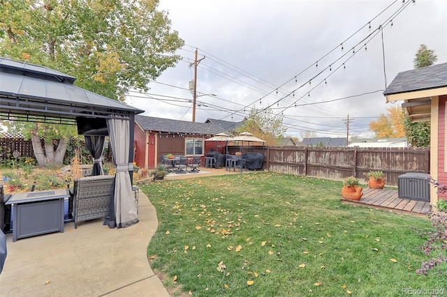 view of yard with a gazebo and a patio