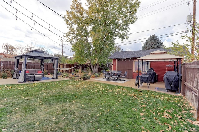 view of yard featuring an outdoor living space, a gazebo, and a patio