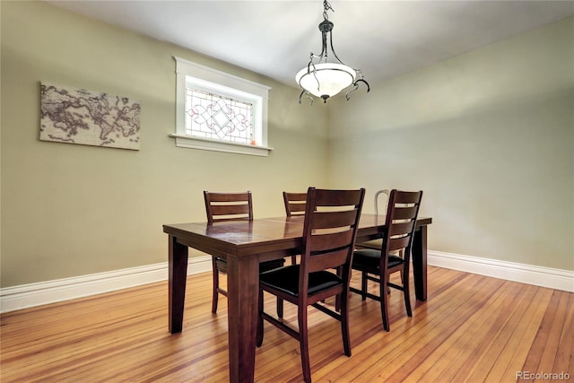 dining room featuring light hardwood / wood-style flooring