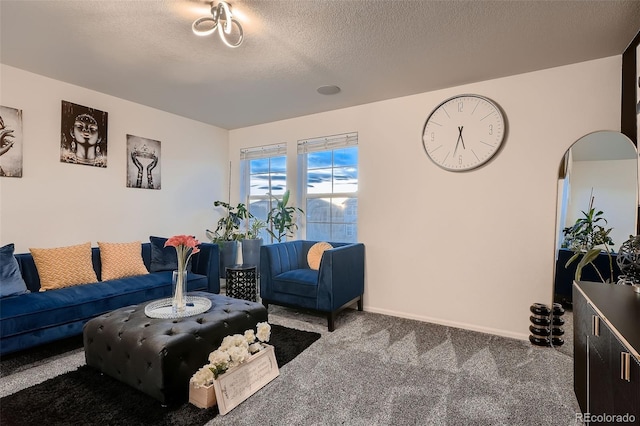 living area with arched walkways, carpet flooring, a textured ceiling, and baseboards