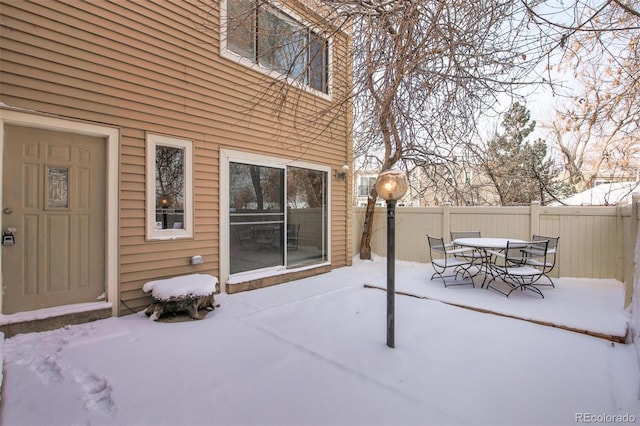 view of snow covered patio