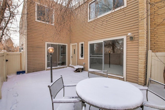 view of snow covered patio