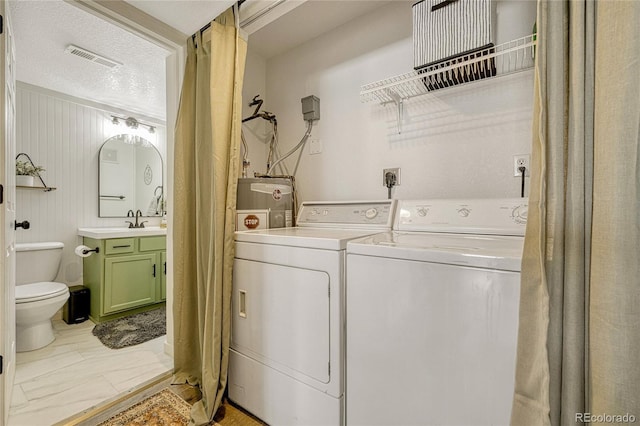 970 S Dawson Way Unit 10, Aurora, CO 80012 - laundry area featuring washing machine and clothes dryer