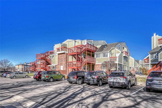 970 S Dawson Way Unit 10, Aurora, CO 80012 - view of building exterior with uncovered parking