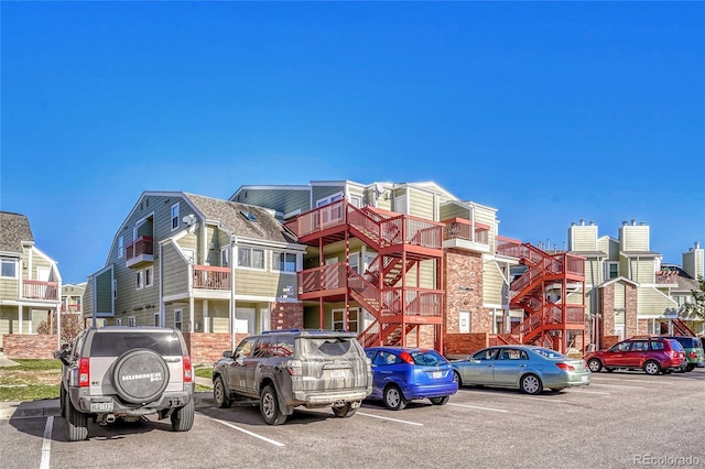 970 S Dawson Way Unit 10, Aurora, CO 80012 - view of building exterior with uncovered parking
