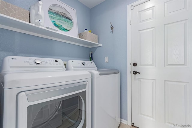 laundry room featuring laundry area and washing machine and dryer