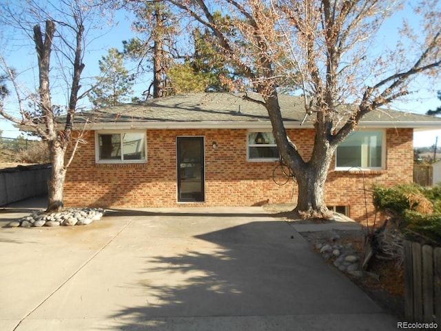 ranch-style house featuring a patio area