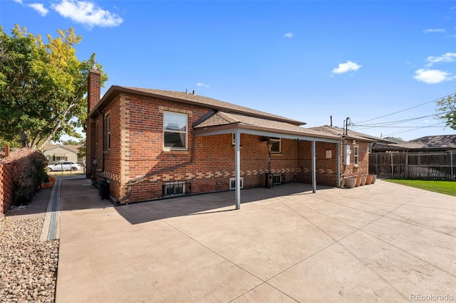 back of property featuring a patio