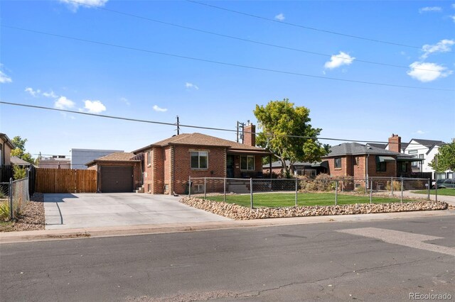 ranch-style home featuring a garage