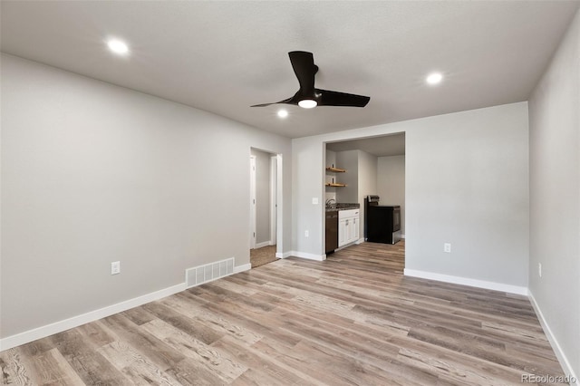 229-231 Crestone Ave, Colorado Springs, CO 80905 - unfurnished living room featuring ceiling fan, light wood-style floors, and recessed lighting