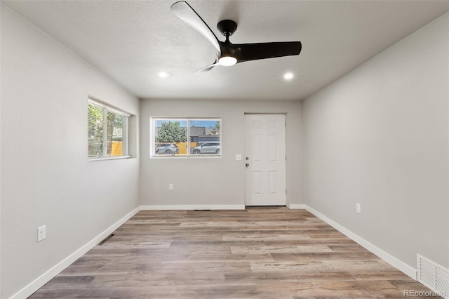 229-231 Crestone Ave, Colorado Springs, CO 80905 - empty room featuring a ceiling fan, light wood-style floors, and recessed lighting