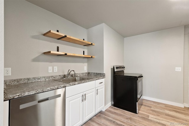 229-231 Crestone Ave, Colorado Springs, CO 80905 - kitchen featuring range with electric stovetop, dishwasher, open shelves, light wood-style floors, and white cabinets